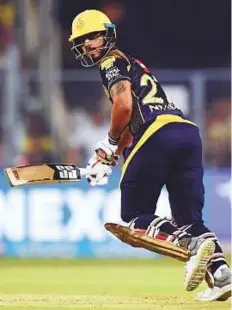  ?? AFP ?? Kolkata Knight Riders’ Nitish Rana guides one down to thirdman against Delhi Daredevils. Rana has so far has scored 165 runs in six games at 33.00 and picking up four wickets.
