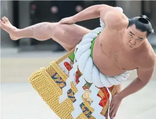  ?? KOJI SASAHARA/THE ASSOCIATED PRESS FILE PHOTO ?? Former grand champion Harumafuji of Mongolia fractured the skull of countryman Takanoiwa during an altercatio­n at a restaurant in October 2017. Harumafuji is hoping to make a comeback.