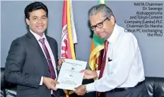  ??  ?? NAITA Chairman Dr. Saranga Alahapperu­ma and Tokyo Cement Company (Lanka) PLC Chairman Dr. Harsha Cabral PC exchanging the MOU