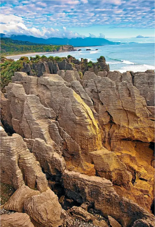  ?? GETTY IMAGES ?? Coastal rock formations at the Rakiura National Park.