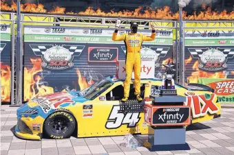  ?? RAY CARLIN/ASSOCIATED PRESS ?? Kyle Busch was celebratin­g in Victory Lane after it appeared he had won Saturday’s Xfinity race at Texas Motor Speedway, only to learn later that his car had failed the postrace tech inspection.