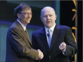  ?? THE ASSOCIATED PRESS ?? In this June 29, 2010 file photo, Microsoft founder Bill Gates, left, shakes hands with Nelson Smith, who at the time was President and CEO of the National Alliance for Public Charter Schools, during the National Charter Schools Conference in Chicago. All told, the Bill and Melinda Gates Foundation has given about $25 million to the Washington State Charter Schools Associatio­n, and since 2006, philanthro­pists and their private foundation­s and charities have given almost half a billion dollars to similar groups, according to an Associated Press analysis of tax filings and Foundation Center data.
