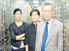  ?? Sean Lyness PBS Distributi­on ?? THOMAS SUNG is shown with daughters Vera, left, and Jill in the documentar­y.