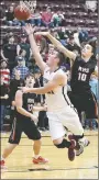  ?? Bud Sullins/Special to Siloam Sunday ?? Siloam Springs senior Noah Karp drives to the basket against Friday against Russellvil­le. Karp scored 18 points in the Panthers’ 66-49 win on senior night.