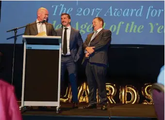  ?? PHOTOS: CONTRIBUTE­D ?? Ray White Toowoomba principals Andrew Carter, Myles Cosgrove and Lindsay Southwell entertain the crowd at their awards evening.
