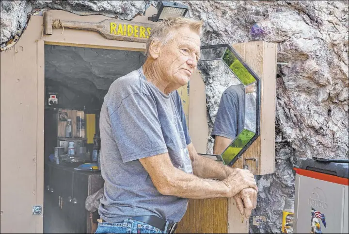  ?? L.E. Baskow Las Vegas Review-Journal @Left_Eye_Images ?? Richard Roman has lived in an abandoned mine shaft for seven years. Boulder City officials are debating what to do about his home, which sits on city-owned property.