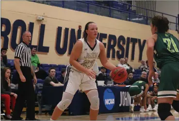  ?? COURTESY JOHN CARROLL ATHLETICS ?? John Carroll forward Nicole Heffington handles the ball against Wilmington on Feb. 25 during the first round of the OAC women’s tournament.