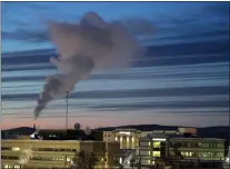  ?? MARK THIESSEN — THE ASSOCIATED PRESS ?? This Feb. 16, 2022, photo shows a plume of smoke being emitted into the air from a power plant in Fairbanks, Alaska, which has some of the worst polluted winter air in the United States. Over seven weeks this winter, nearly 50 scientists from the continenta­l U.S. and Europe descended on Fairbanks to study the sources of air pollution.