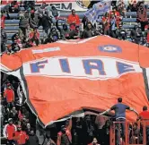  ?? GETTY IMAGES ?? Fire fans still love the current logo and team colors, which have been around since 1997.