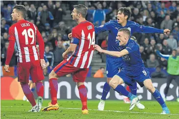 ?? AFP ?? Leicester City’s Jamie Vardy, No.9, reacts after scoring against Atletico Madrid.