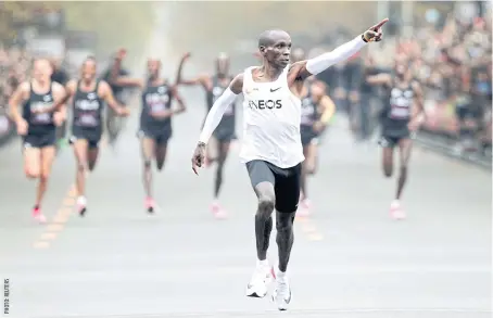  ??  ?? Kenyan runner Eliud Kipchoge wore Vaporflys when he ran the first sub-twohour marathon in Vienna last October.