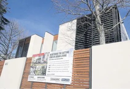  ?? AP ?? A house is pictured for sale in Christchur­ch on Monday. New Zealand has banned most foreigners from buying homes as it tries to tackle runaway housing prices.