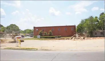  ?? Kevin Myrick/SJ ?? All that remained of the old Lankford building along the train tracks was a pile of rubble waiting to be cleared away on June 1 by city public works employees who took care of the demolition labor.