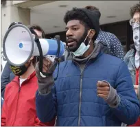  ??  ?? Alan Dennard, an organizer with Detroit Will Breathe, said Macomb County Prosecutor Peter Lucido has “only hate in his heart” as he called on the law enforcer to dismiss charges against the Shelby 5.