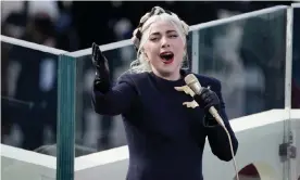  ?? Photograph: Greg Nash/AFP/Getty Images ?? Lady Gaga sings the American national anthem for the inaugurati­on of Joe Biden.