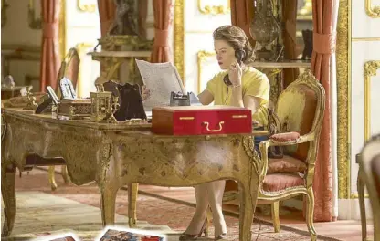  ??  ?? The Queen (Claire Foy) at work