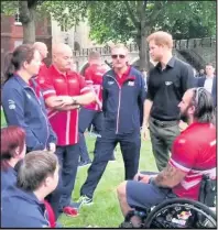  ??  ?? Steve Cokayne (above) is to compete in the 2017 Invictus Games in Toronto, Canada, representi­ng the UK. He collected his national kit and posed for this official team photo at a team introducti­on day where he also met HRH Prince Harry (right)