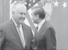  ?? ANDY WONG/GETTY-AFP ?? Secretary of State Rex Tillerson meets with Chinese Foreign Minister Wang Yi on Saturday.
