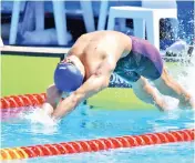  ??  ?? National swimmer Tern Jian Han clocked 25.60s in the semi-finals of the men’s 50m backstroke event of the 2018 Commonweal­th Games in Gold Coast, Australia to erase the national record of 25.67s. - Bernama photo