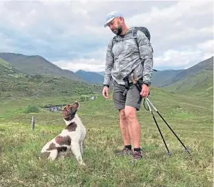  ??  ?? Mac Wright with beloved retired gun dog Genghis.