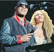  ??  ?? STEVIE Wonder and daughter Aisha Morris take the stage at his benefit concert Sunday at Staples.
