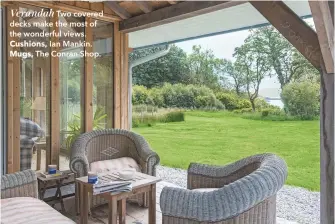  ??  ?? Verandah Two covered decks make the most of the wonderful views. Cushions, Ian Mankin. Mugs, The Conran Shop.