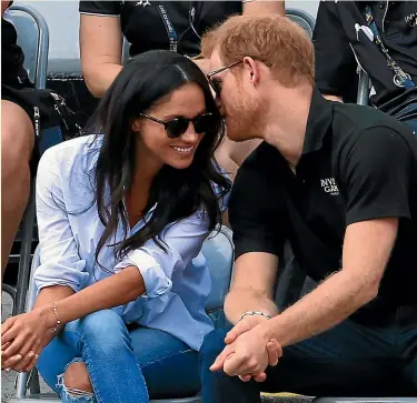  ?? GETTY IMAGES ?? Harry and Meghan have only eyes for each other – and certainly not for those who seek to continuall­y pry into their lives.