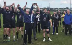  ??  ?? From far left: AIB’s Adrian O’Reilly (vice captain) and Brian Duncan (captain) with the league trophy; Players celebrate their victory last season