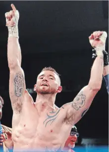  ?? CLIFFORD SKARSTEDT EXAMINER ?? Cody Crowley celebrates his win over Kevin Higson for the Canadian Profession­al Boxing Council super-welterweig­ht National Title and Internatio­nal Title in Mayhem at the Memorial Centre on May 5.