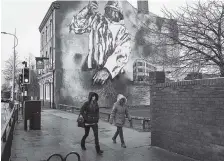  ?? THE NEW YORK TIMES ?? A mural recalling the city’s former status as a center of the fishing industry is seen last month in Hull, England.