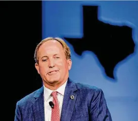  ?? Lola Gomez/TNS file photo ?? Attorney General Ken Paxton says settling a $3.3 million lawsuit filed by “rogue” whistleblo­wer aides will free his office “from this unfortunat­e sideshow.” He also has to apologize to the four former employees.