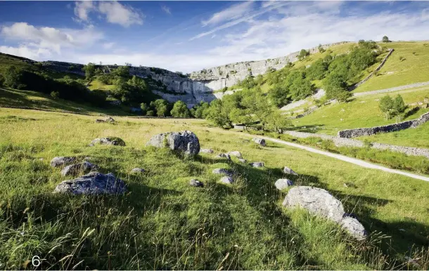  ??  ?? ABOVE A wide and towering curve of limestone, Malham Cove was once home to an immense waterfall