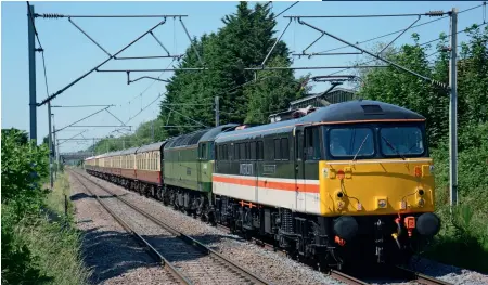  ??  ?? LEFT: After a torrid 2020, the railtour market is hoping for much better times in 2021. Among the highlights will be the use of LSL’s newly establishe­d fleet of AC electrics hauling a rake of Inter-City-liveried Mk 3s. During a test run, Class 87 87002 Royal Sovereign passes Winsford on June 25, 2020 with the 5Z89 Carlisle to Crewe ECS. (Brad Joyce)