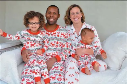  ?? PHOTO BY TIM BUTRIE ?? Lauren Gaines’ (right) family wears matching pajamas each Christmas – and sometimes on Halloween.