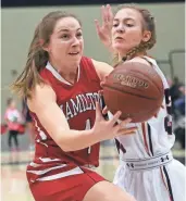  ?? JOHN KLEIN / FOR THE MILWAUKEE JOURNAL SENTINEL ?? Sussex Hamilton’s Macy Williams drives past Brookfield East’s Adriana Plavsic. More at jsonline.com/sports.