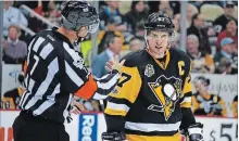  ?? ASSOCIATED PRESS FILE PHOTO ?? Pittsburgh Penguins' Sidney Crosby, right, listens to ref Garrett Rank in an NHL game against the Detroit Red Wings on Feb. 19, 2017.