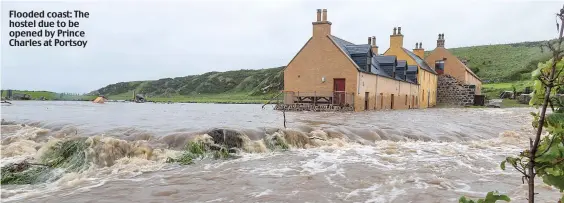  ??  ?? Flooded coast: The hostel due to be opened by Prince Charles at Portsoy