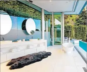  ??  ?? THE ASKING PRICE for the five-bedroom six-bathroom contempora­ry, designed by Paul McClean, is $19.995 million.