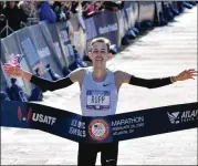  ??  ?? Galen Rupp, the bronze-medal winner at the 2016 Olympics in Rio de Janeiro, won the men’s race in a time of 2:09.20, becoming the first American man to win consecutiv­e U.S. marathon Olympic Trials races.