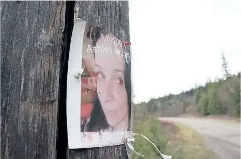  ?? FILE PHOTO ?? A missing person poster for Ashley Simpson on a post in British Columbia. Simpson disappeare­d near Salmon Arm, B.C. in April of last year. She is originally from St. Catharines, where here family still lives.