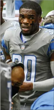  ?? DANNY KARNIK — THE ASSOCIATED PRESS ?? Detroit Lions cornerback Jeff Okudah (30) waits on the sidelines against the Atlanta Falcons.