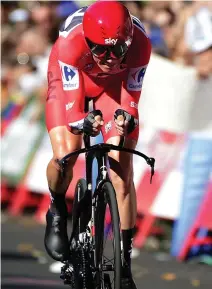  ??  ?? Sky's British cyclist Christophe­r Froome crosses the finish line to win the 16th stage of the 72nd edition of La Vuelta Tour of Spain cycling race on Tuesday. (AFP)