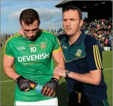  ??  ?? Meath manager Andy McEntee with James Toher after the game.