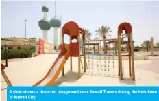  ??  ?? A view shows a deserted playground near Kuwait Towers during the lockdown in Kuwait City.