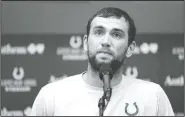  ?? AP/MICHAEL CONROY ?? Indianapol­is Colts quarterbac­k Andrew Luck speaks during a news conference announcing his retirement following an NFL preseason football game against the Chicago Bears on Saturday in Indianapol­is. The oft-injured star is retiring at age 29.