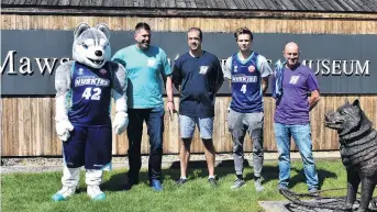  ?? PHOTO: SUPPLIED ?? Creating history . . . Southern Huskies personnel (from left) mascot Mawson, chief executive Justin Hickey, inaugural head coach Anthony Stewart, player Jack Stanwix and chief operating officer Mike Sutton line up during the announceme­nt earlier this month the team would be joining the New Zealand NBL.