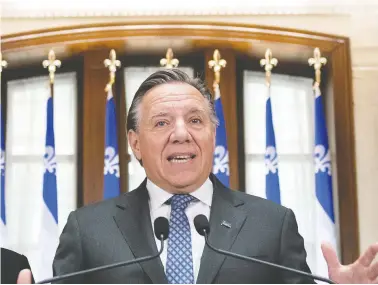  ?? JACQUES BOISSINOT / THE CANADIAN PRESS ?? “This sends a strong signal that if you want to come and live in Quebec you have to know the values
of Quebec,” says Premier François Legault of the province’s values test for new immigrants.