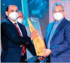  ?? ?? Asian Chill Equipment (Pvt.) Ltd Managing Director Vajira Kumara Silva receives award from President Gotabaya Rajapaksa