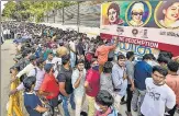  ?? PTI ?? Fans throng to buy tickets for the second Test in Chepauk. The TN govt has allowed the stadium to be filled to 50% capacity.