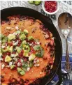  ??  ?? Turkey Tamale Pie folds turkey into enchilada sauce.